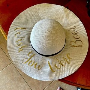 Sun hat with saying “wish you were beer”